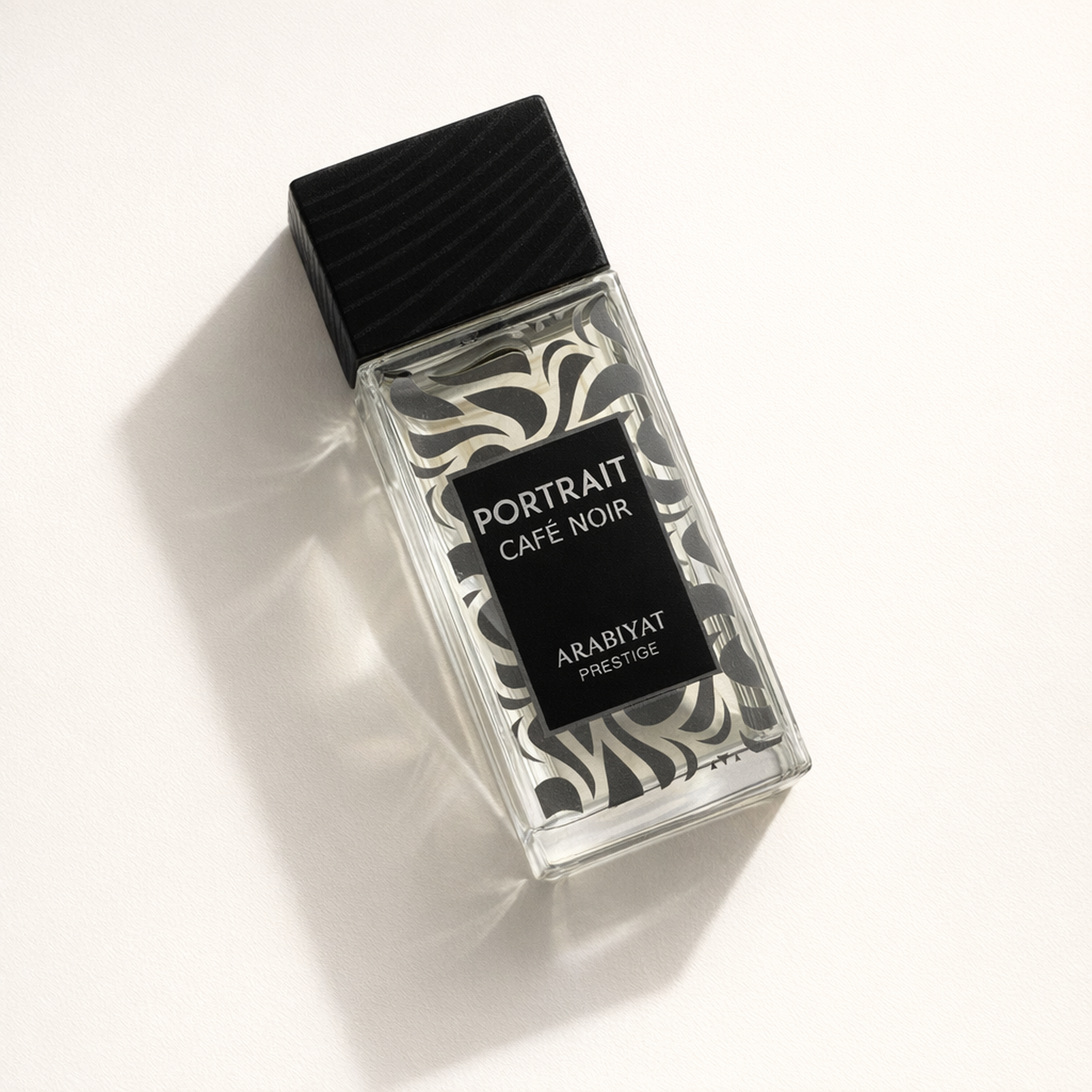 Arabiyat Prestige Portrait Cafe Noir EDP angled still-life gallery showcase