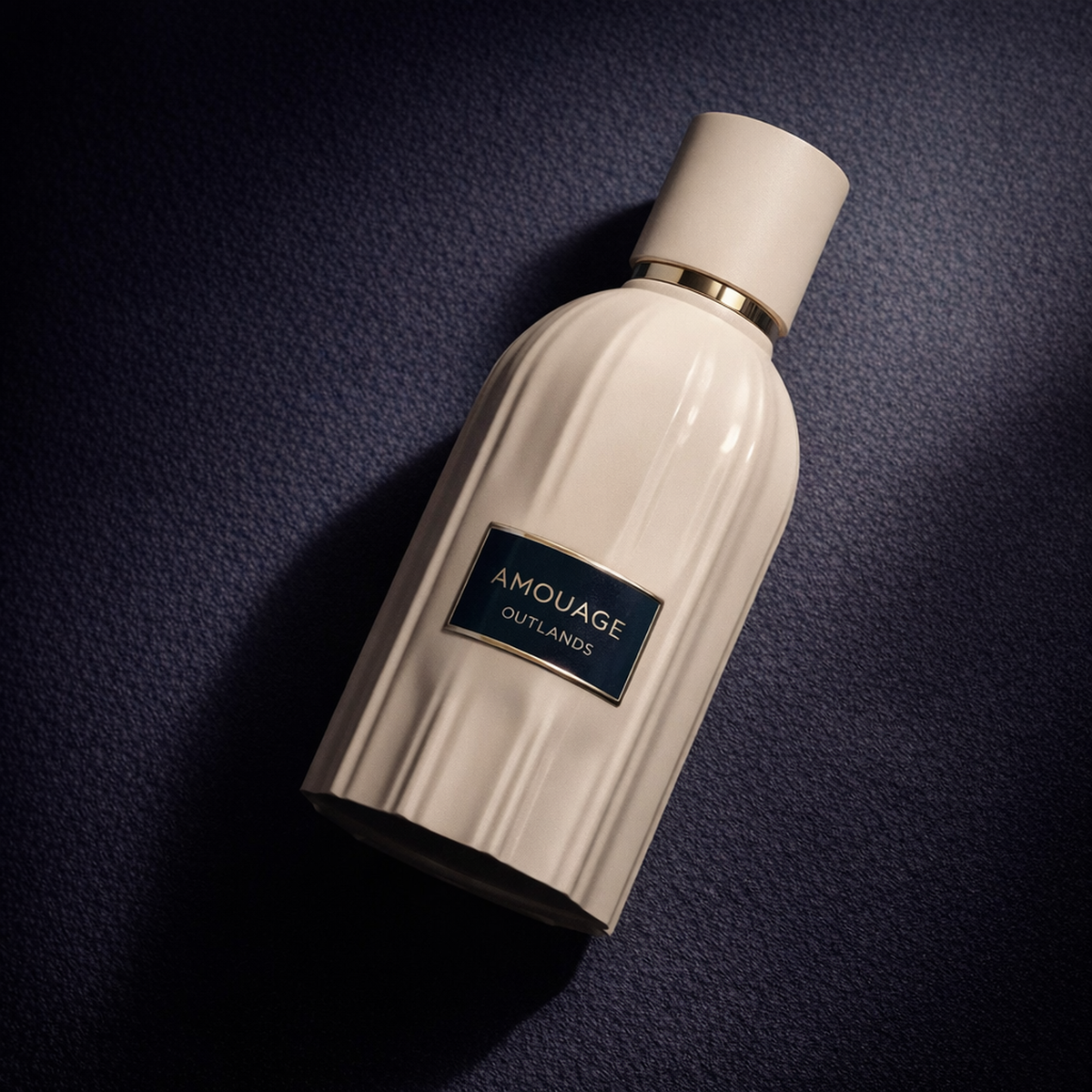 Amouage Outlands Essence Parfum angled still-life gallery showcase
